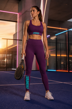 Model wearing the burgundy VAMOS Longline Sports Bra during a padel session for maximum support. www.lobstory.eu