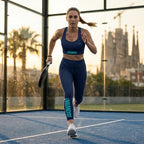 Model wearing the navy blue VAMOS Longline Sports Bra during a padel session for maximum support. lobstory.eu lobstory