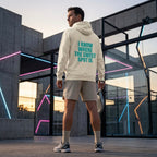 Back view of a model wearing the electric cyan Sweet Spot hoodie showing the bold back branding. www.lobstory.eu