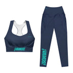 Front view mockup of the navy blue ¡VAMOS! Performance Set featuring the longline sports bra and high-waisted pocket leggings.